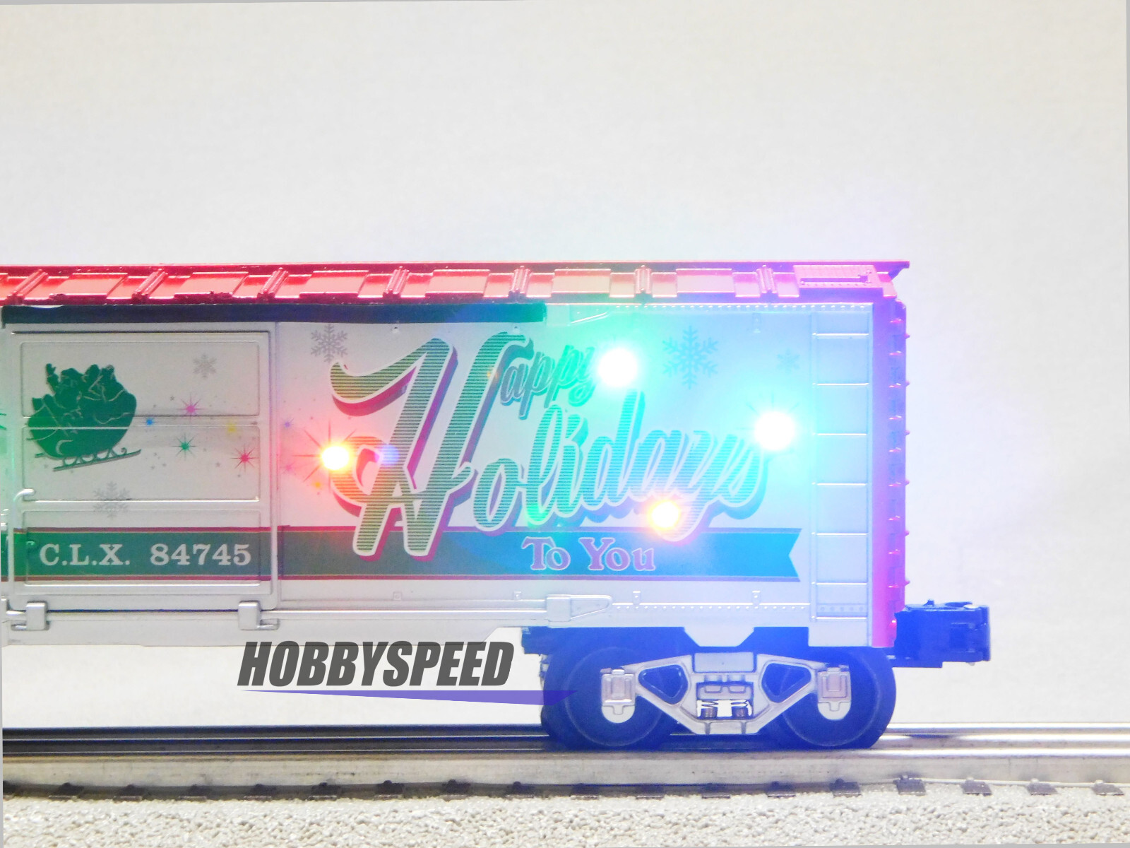 LIONEL CHRISTMAS LIGHT EXPRESS HAPPY HOLIDAYS SOUND BOXCAR O GAUGE 2123100-H NEW