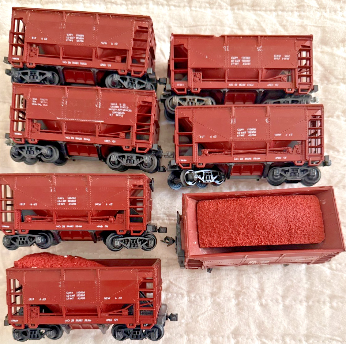 JP HO (7) MDC Roundhouse 24′ Rectangular Side Ore Car Brown w/loads Data Only