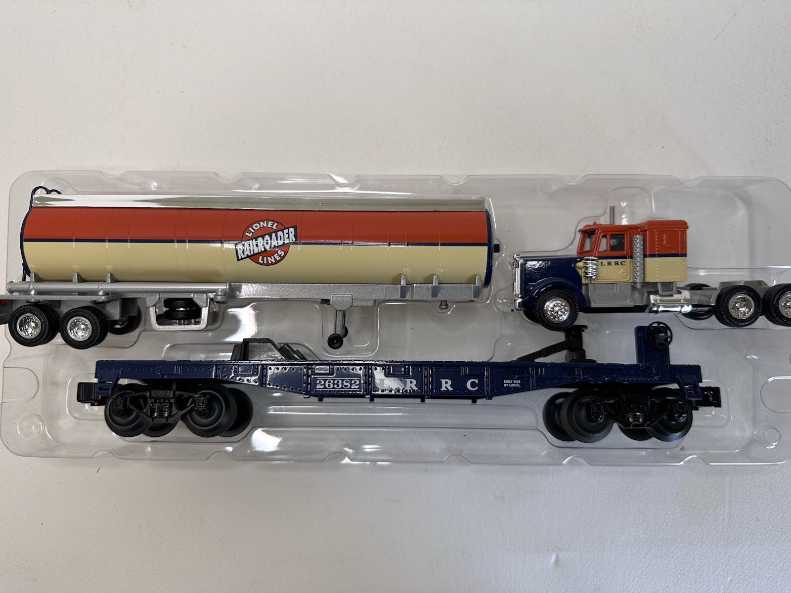LIONEL6-26382 LRRC-FLATCAR W/ DIECAST TRUCK & TANKER TRAILER – LN In Box