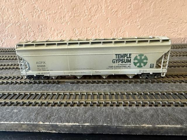 HO Scale ACFX covered hopper #54288. Athearn. Kadees. Weathered freight car.