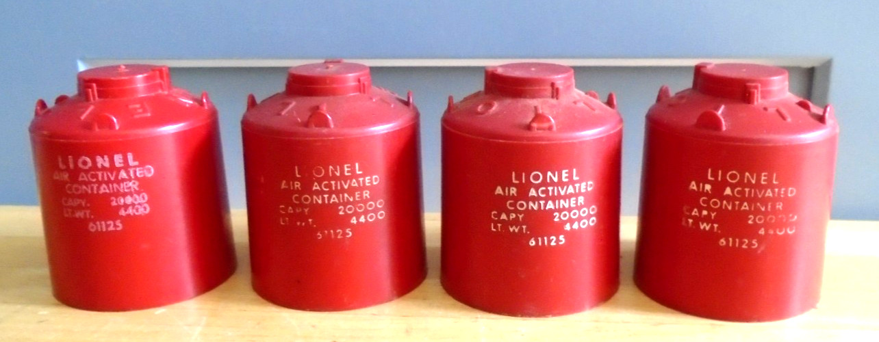 FOUR POSTWAR LIONEL RED O – 027 GAUGE CANISTERS WITH NO BROKEN TABS – GS