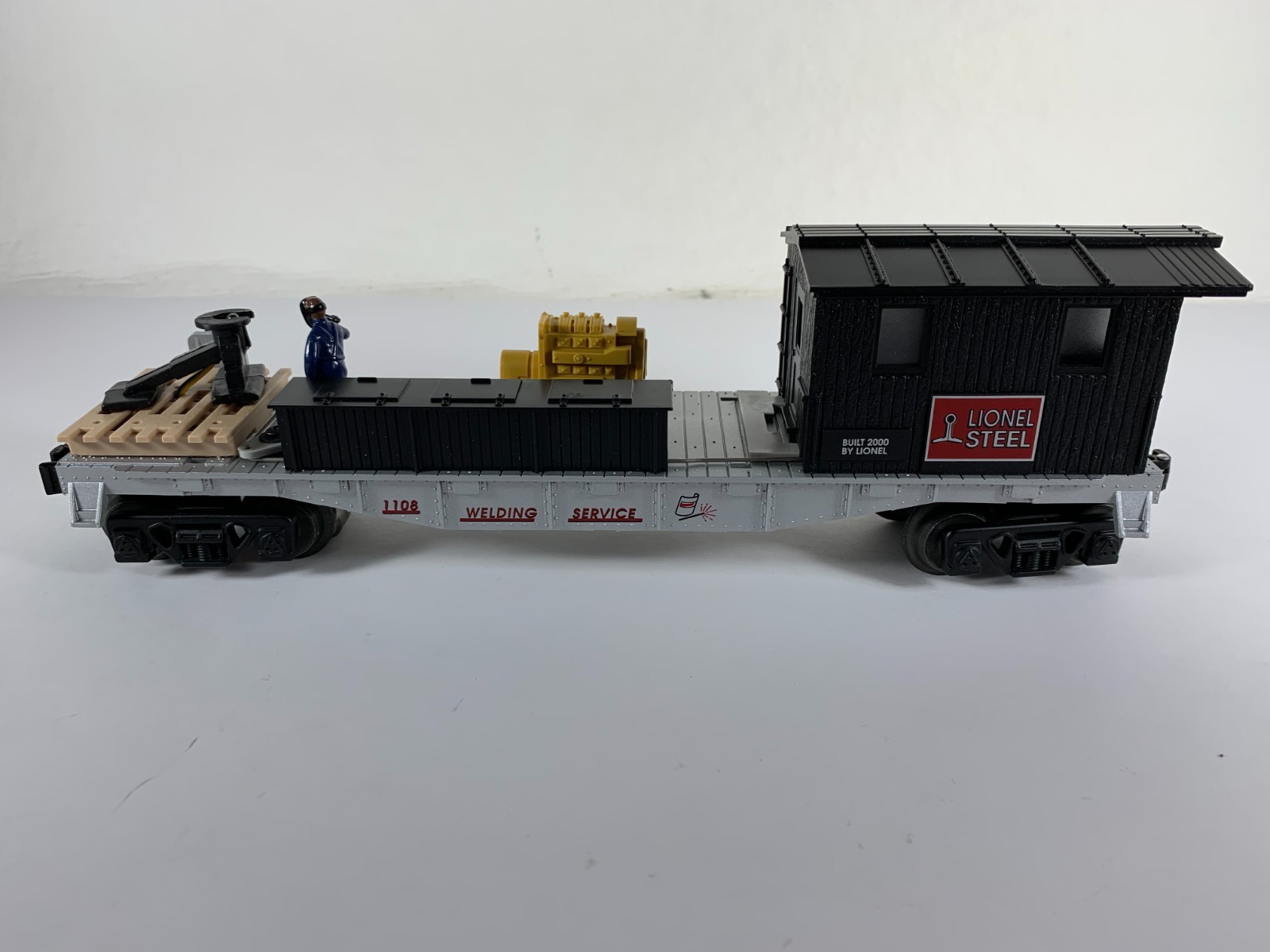 LIONEL 6-26707, LIONEL STEEL OPERATING WELDING FLAT CAR, OB (2000)