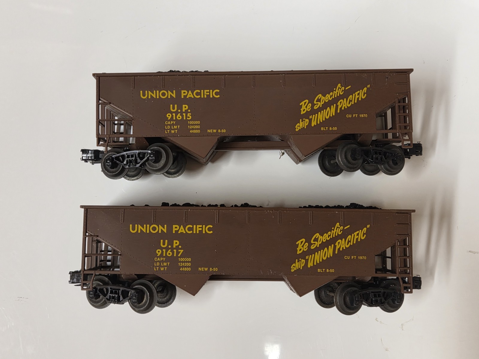 2 O gauge coal hoppers Union Pacific 91615 & 91617 with coal loads unknown maker