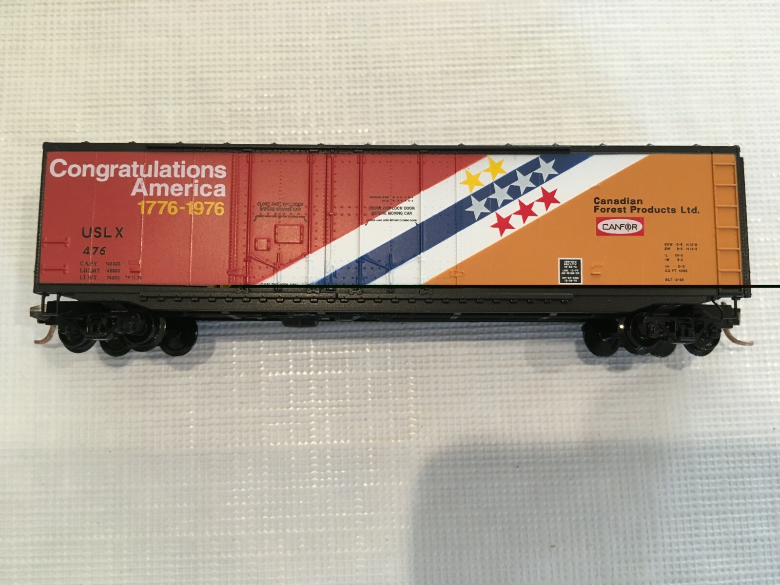 MICRO-TRAINS 75050 N-Gauge Steel Boxcar 50ft, Canadian Forest Products USLX 476