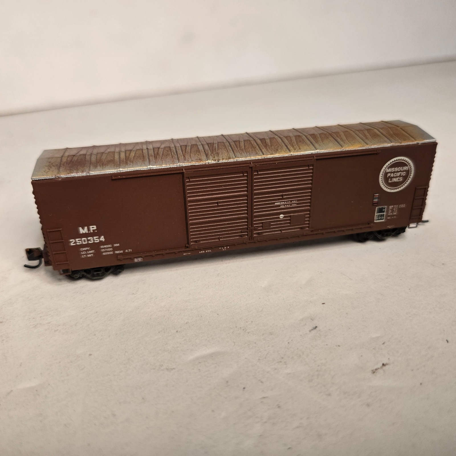Unknown Make N Scale Missouri Pacific Box Car. Weathered.