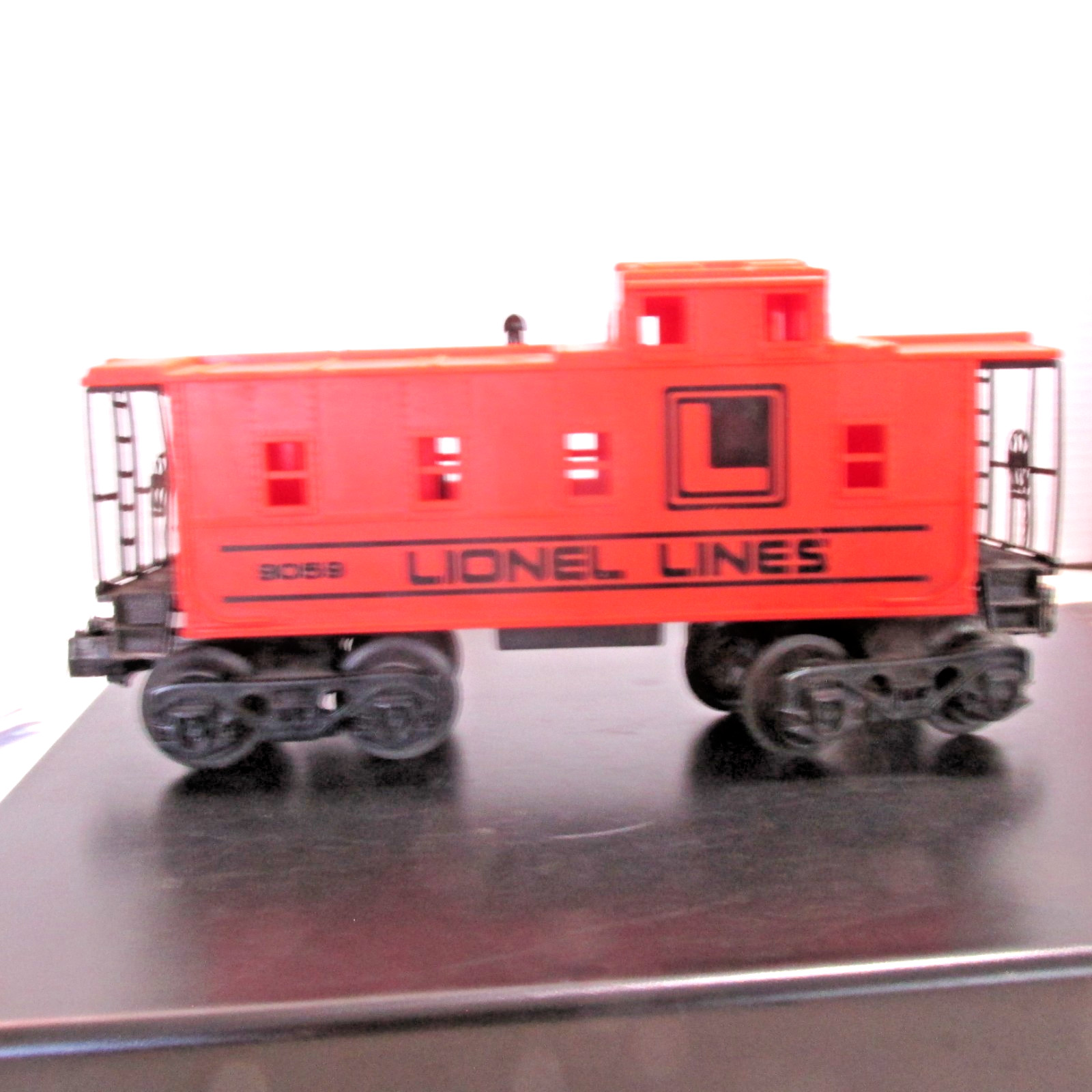 Lionel 9059 Lionel Lines non-Illuminated Orange Caboose O/027 1979 8 wheel USA