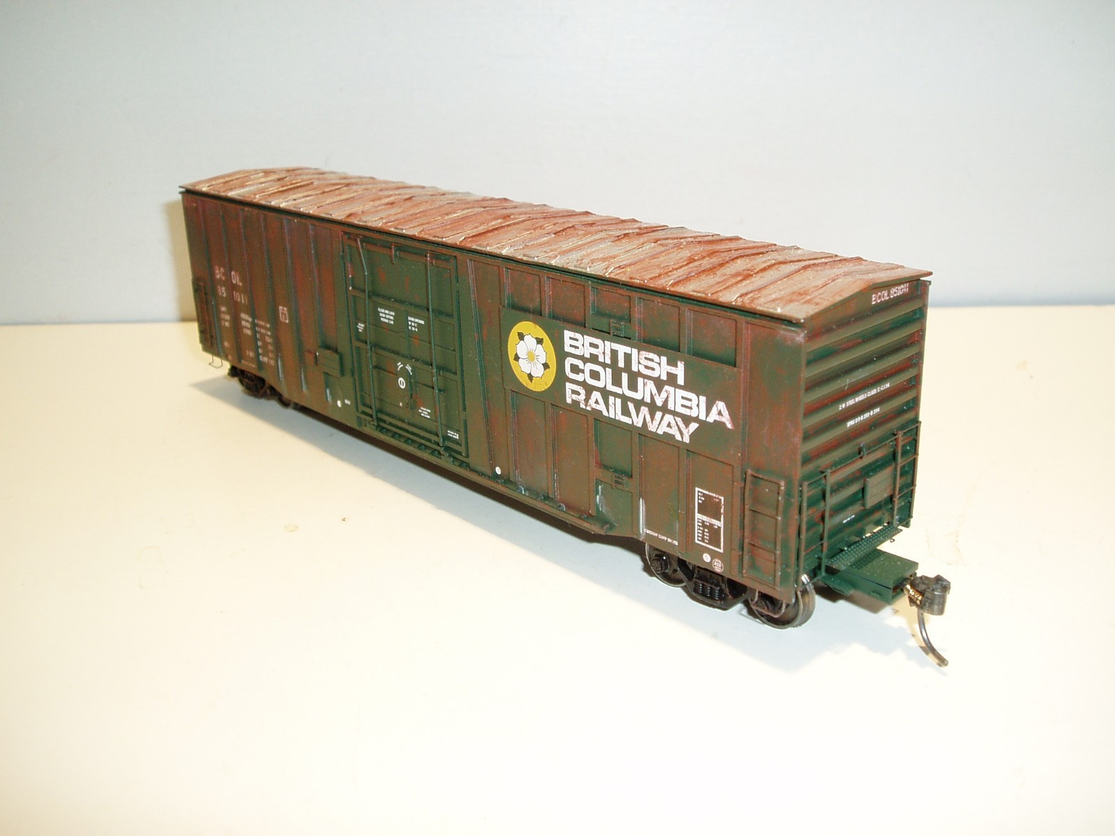 4 HO freight cars, various manufacturers, may need minor repair.