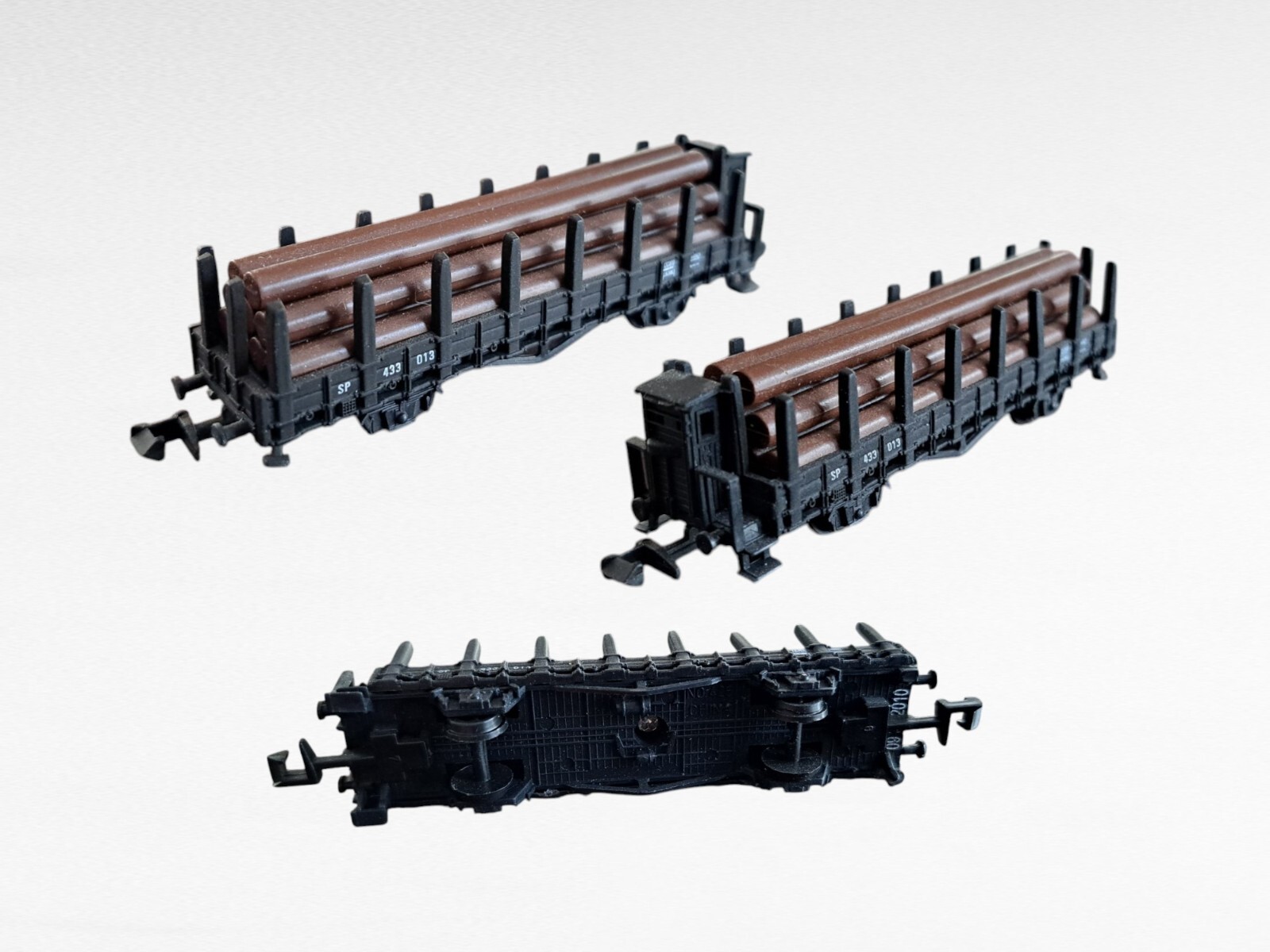 Miniature trains 2 1/2 to 3 1/2 in long EX condition. The details are amazing.