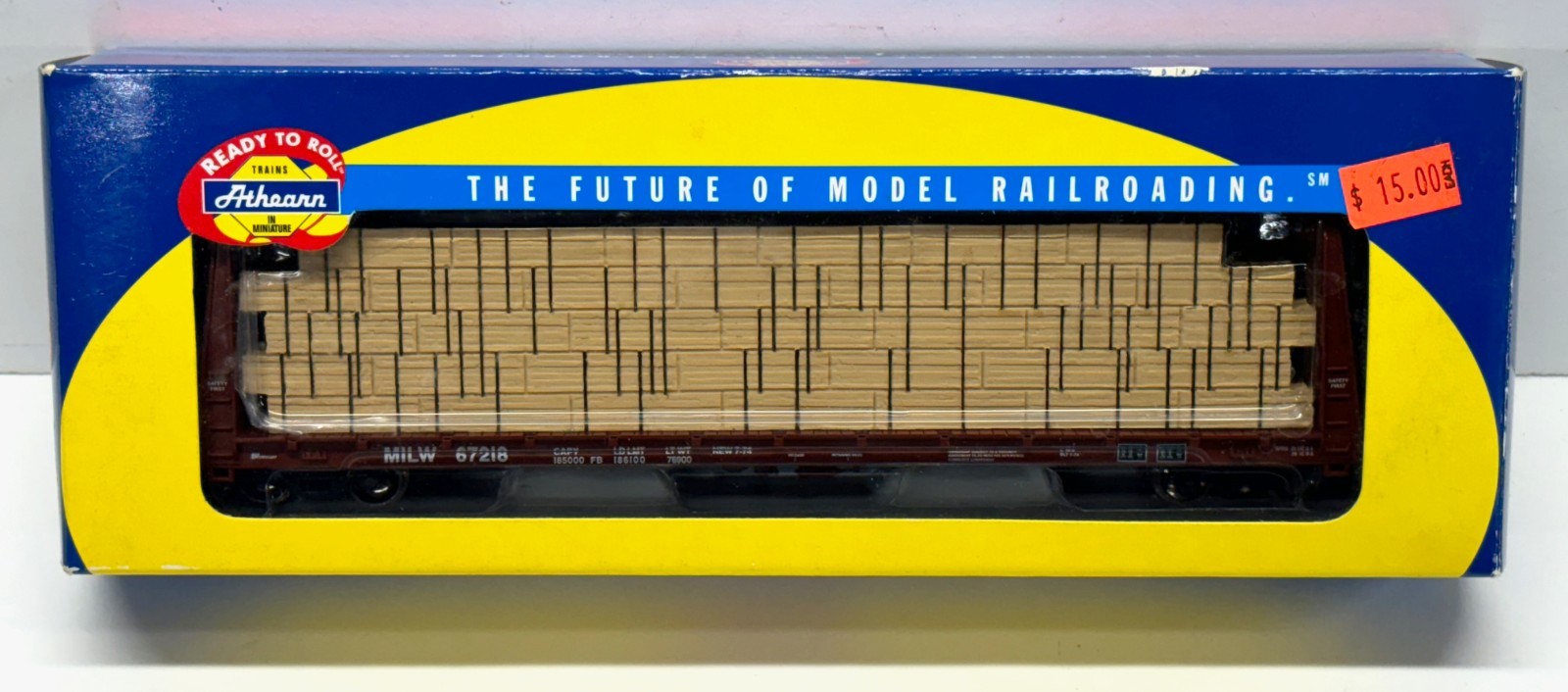 Athearn HO Milwaukee Road 60′ Bulkhead Flat Car w/Load #67218. 92721. New!