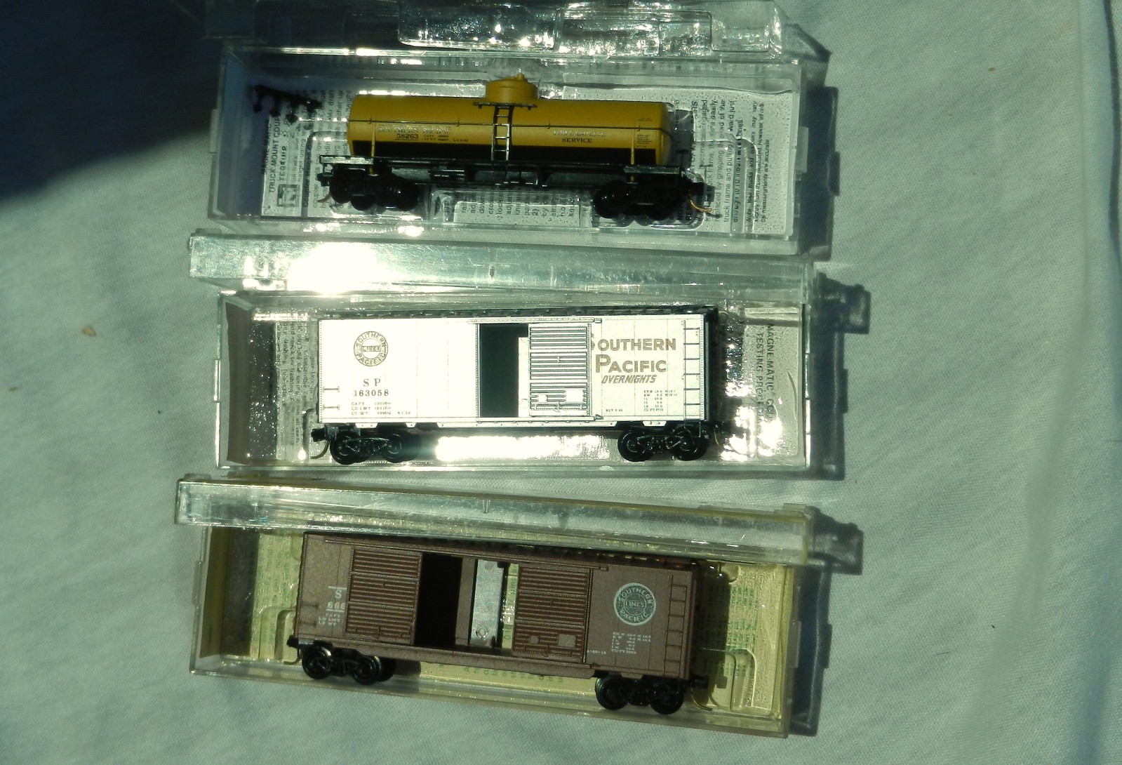 N three Micro Trains Southern Pacific tank car and boxcars LNIB