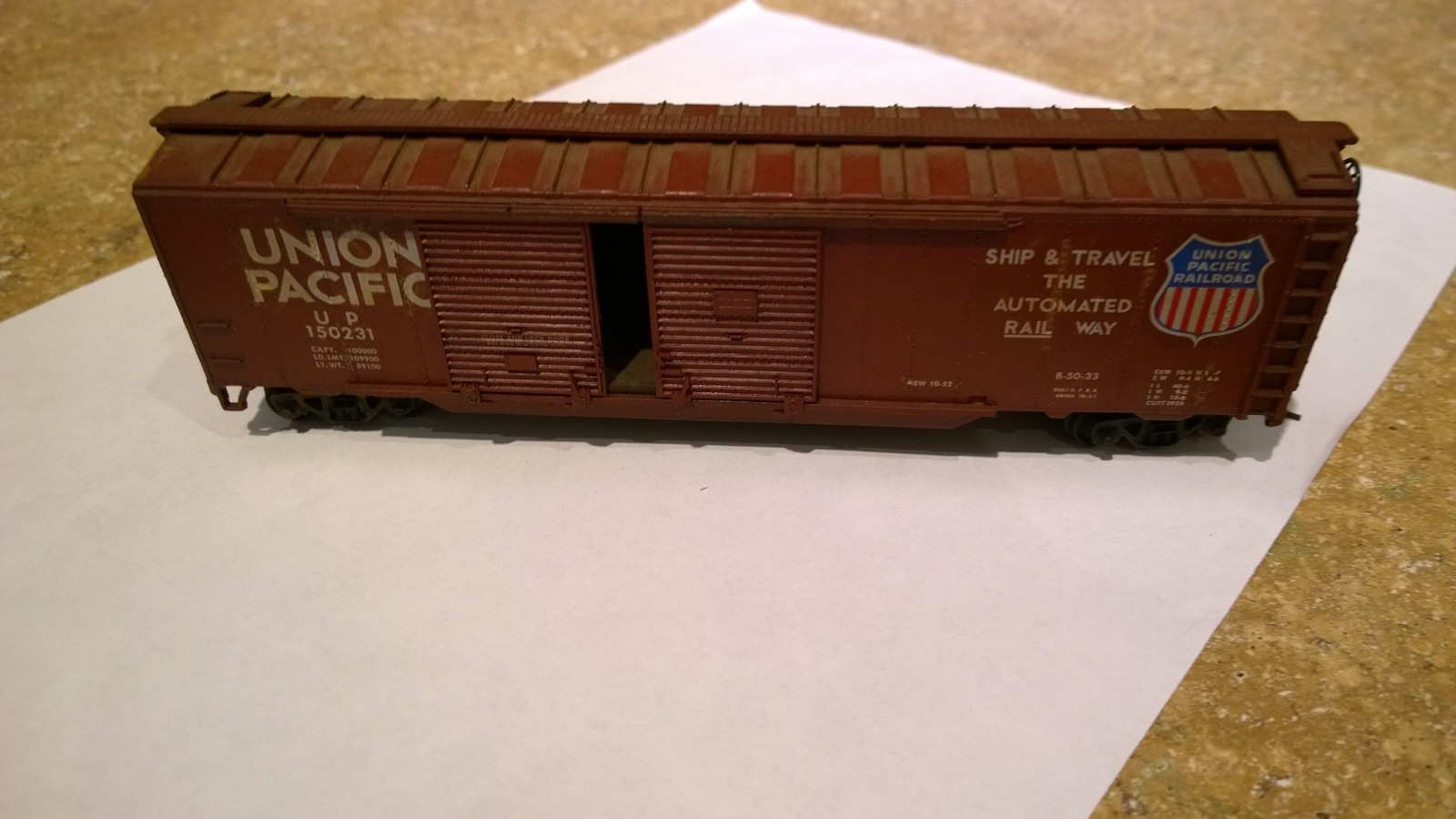 Athearn blue box 50′ DD box car UP. O’Henry couplers and weathered.