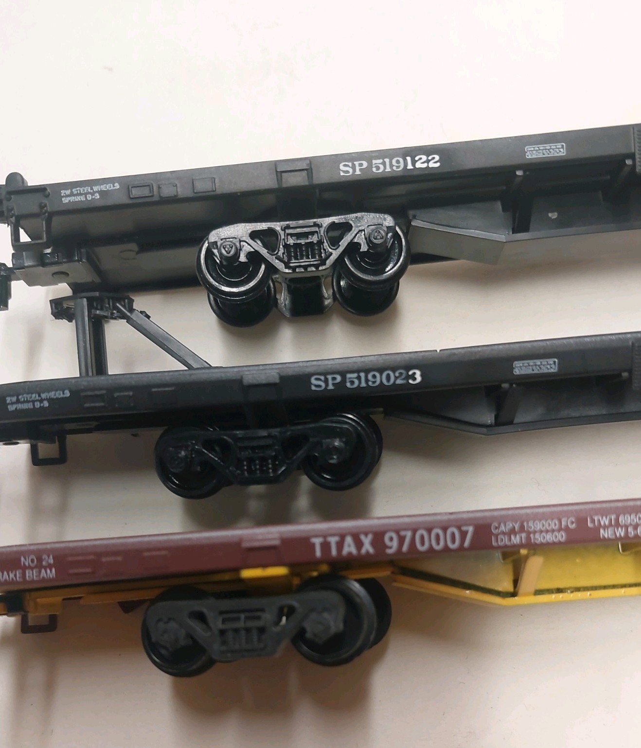 Three Athearn 85′ TOFC Flatcars. Southern Pacific & TTAX