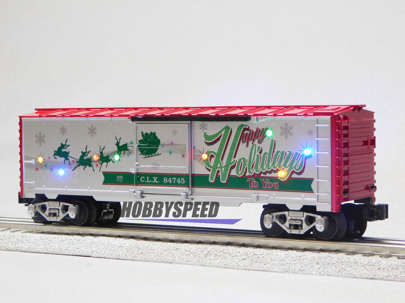 LIONEL CHRISTMAS LIGHT EXPRESS HAPPY HOLIDAYS SOUND BOXCAR O GAUGE 2123100-H NEW