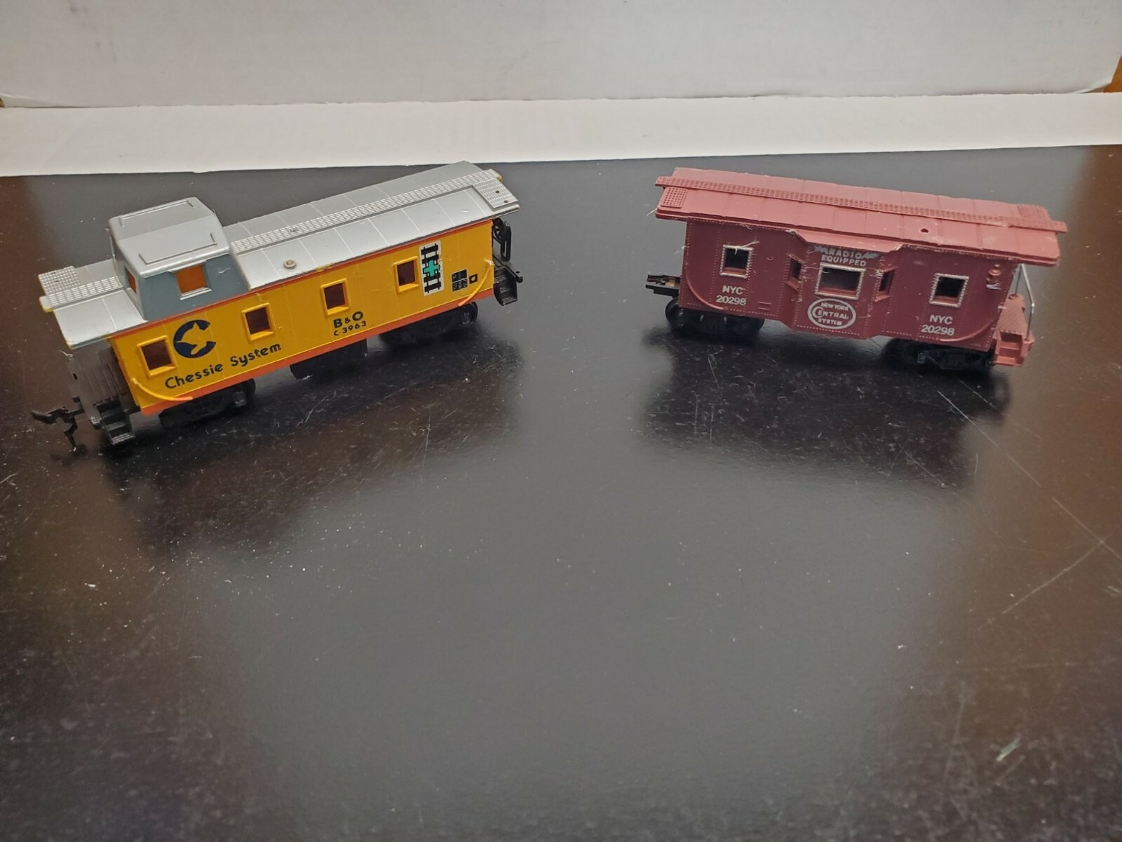 HO Scale Model Railroad – 1 Marx Caboose and 1 Bachmann Caboose