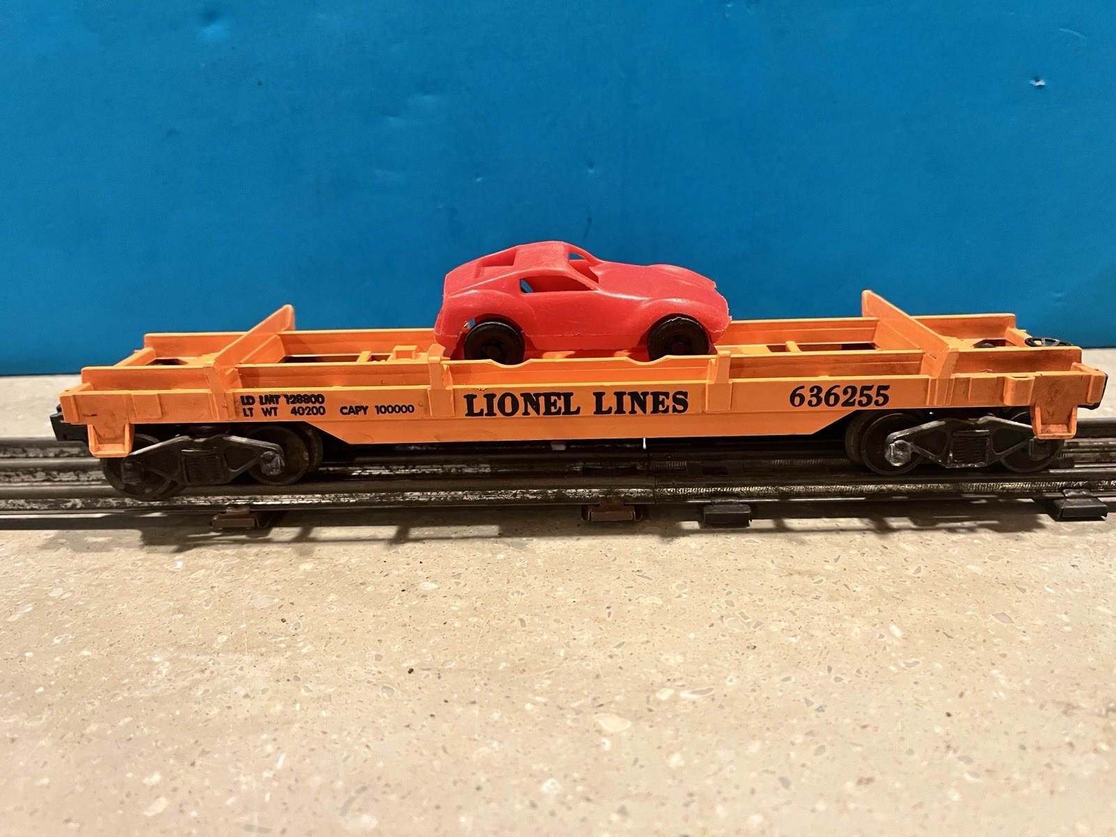 LIONEL LINES POSTWAR O GAUGE 6362 ORANGE RAIL TRUCK FLAT CAR #636255 C7+ 1 CAR.