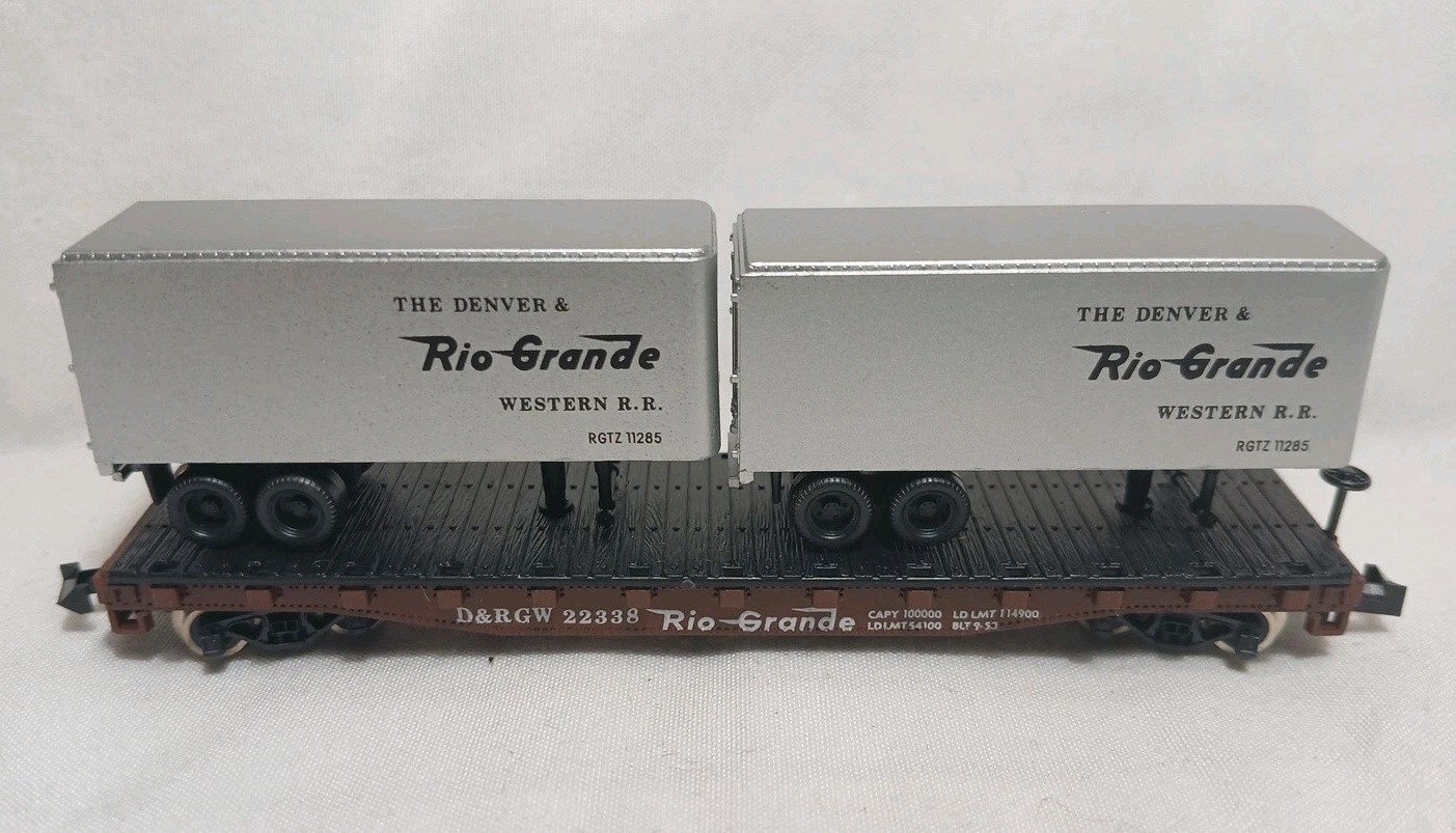 3748 TRAILER FLAT RIO GRANDE 50′ piggyback w/two 24′ silver Rio trailers Atlas