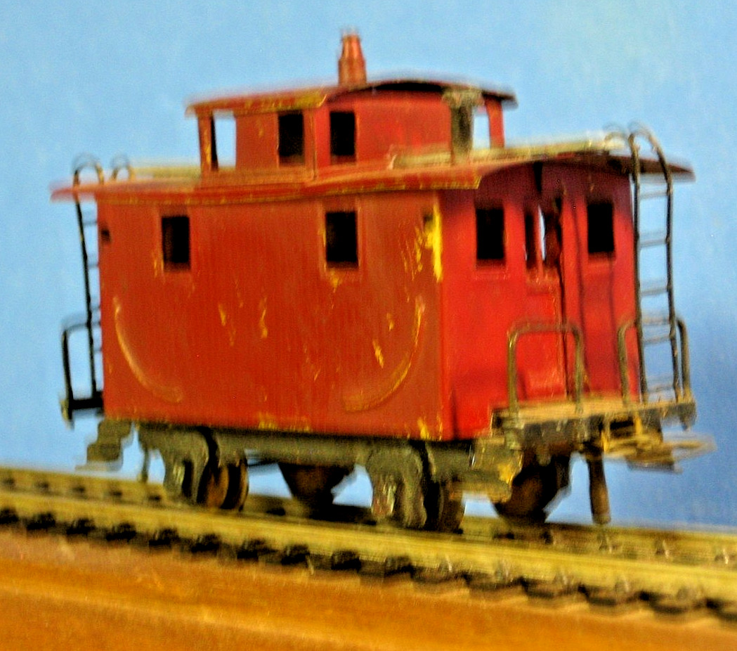 HO Vintage Mantua Brass Bobber caboose ( 4 wheel) , Totally complete, worn paint