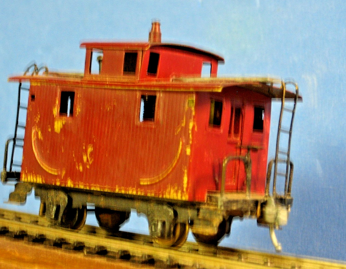 HO Vintage Mantua Brass Bobber caboose ( 4 wheel) , Totally complete, worn paint