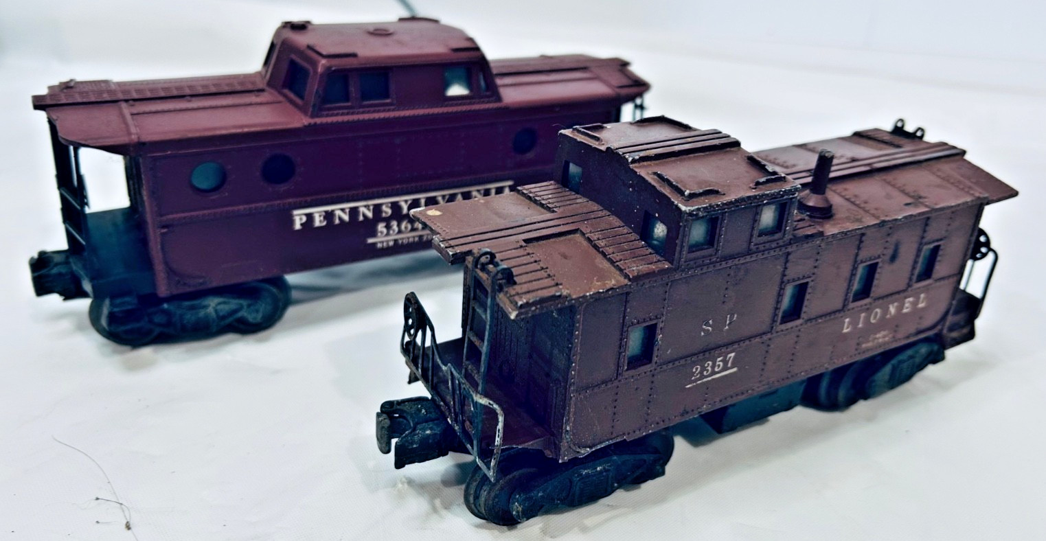 2 Lionel O-O27 Cabooses