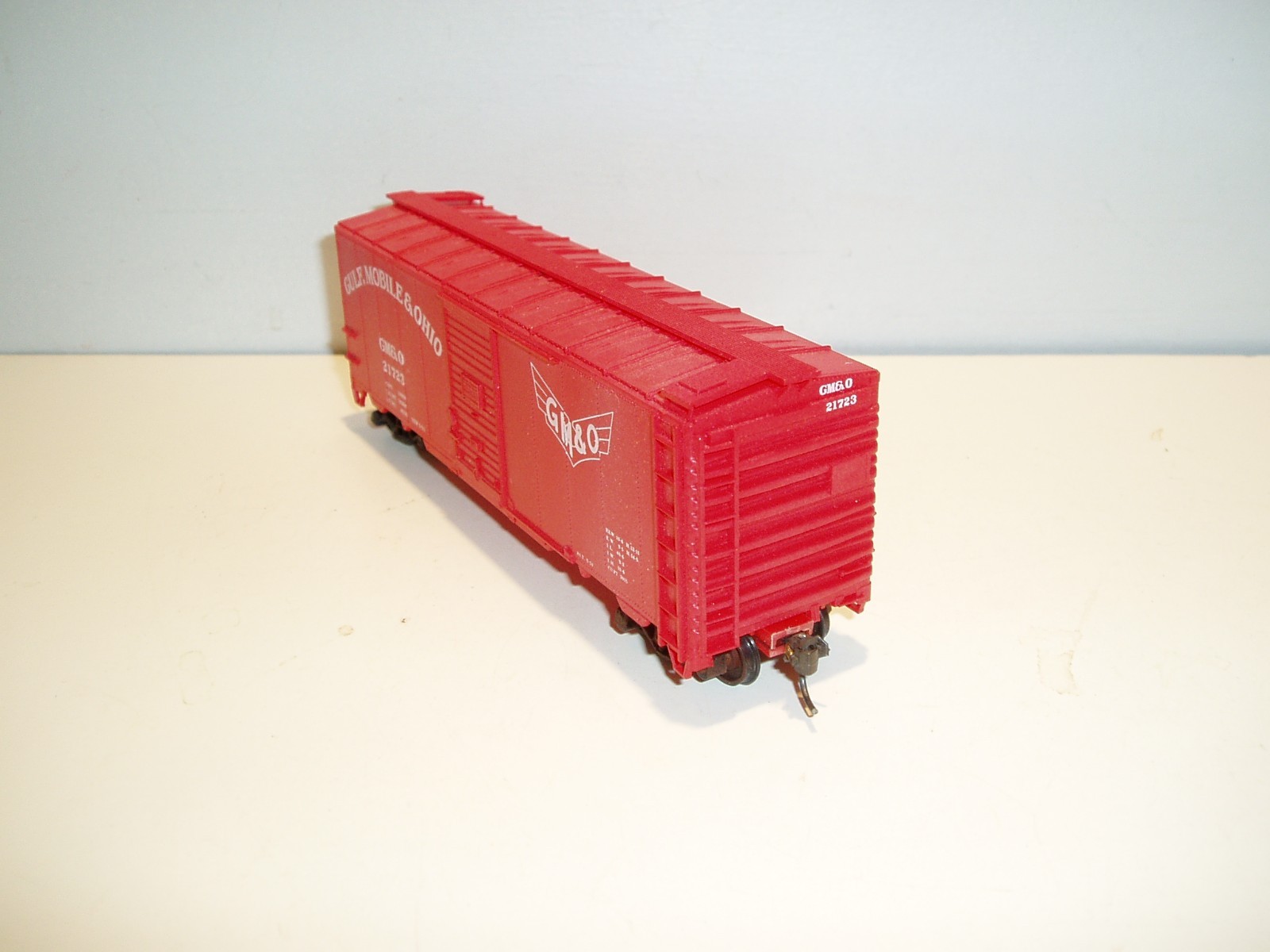 4 HO freight cars, various manufacturers, may need minor repair.