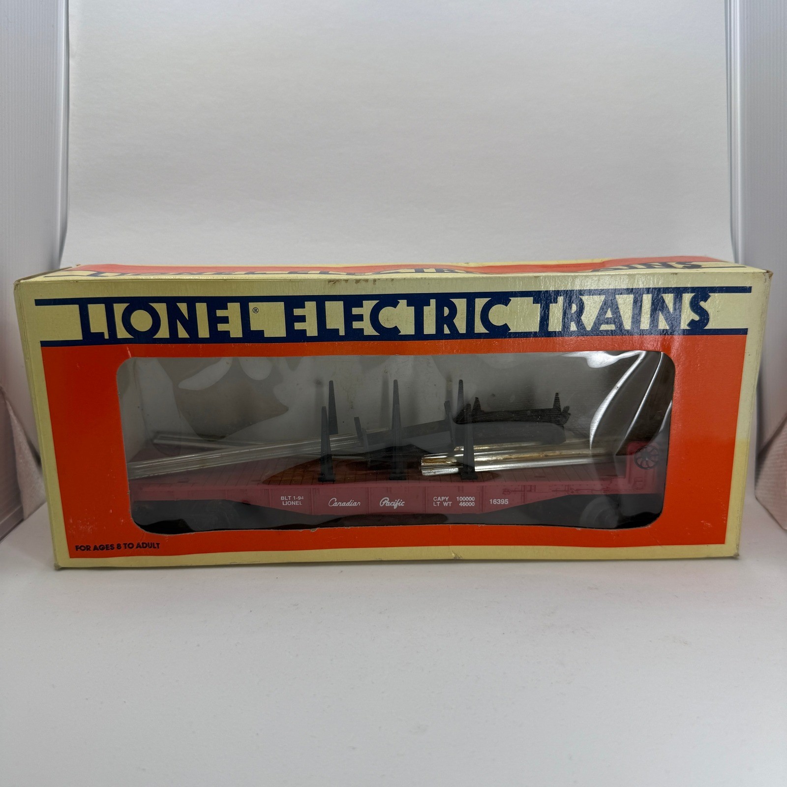 Lionel 16395 Canadian Pacific Flatcar with Stakes and Pipe Load