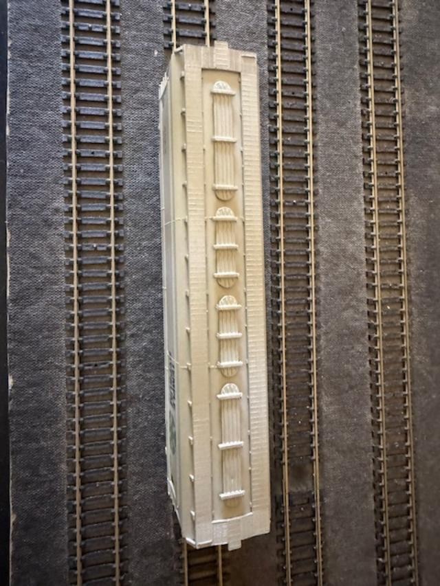 HO Scale ACFX covered hopper #54288. Athearn. Kadees. Weathered freight car.