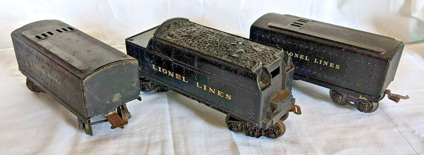 1940’s Lionel Train Cars. Coal Car, and Two Box Cars. Pressed Steel