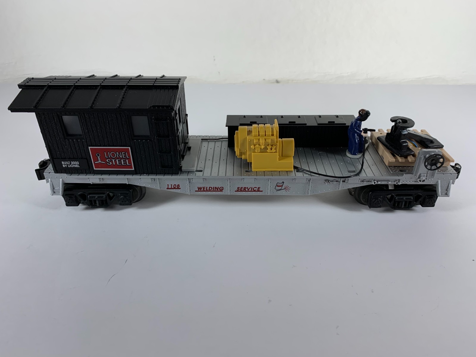 LIONEL 6-26707, LIONEL STEEL OPERATING WELDING FLAT CAR, OB (2000)