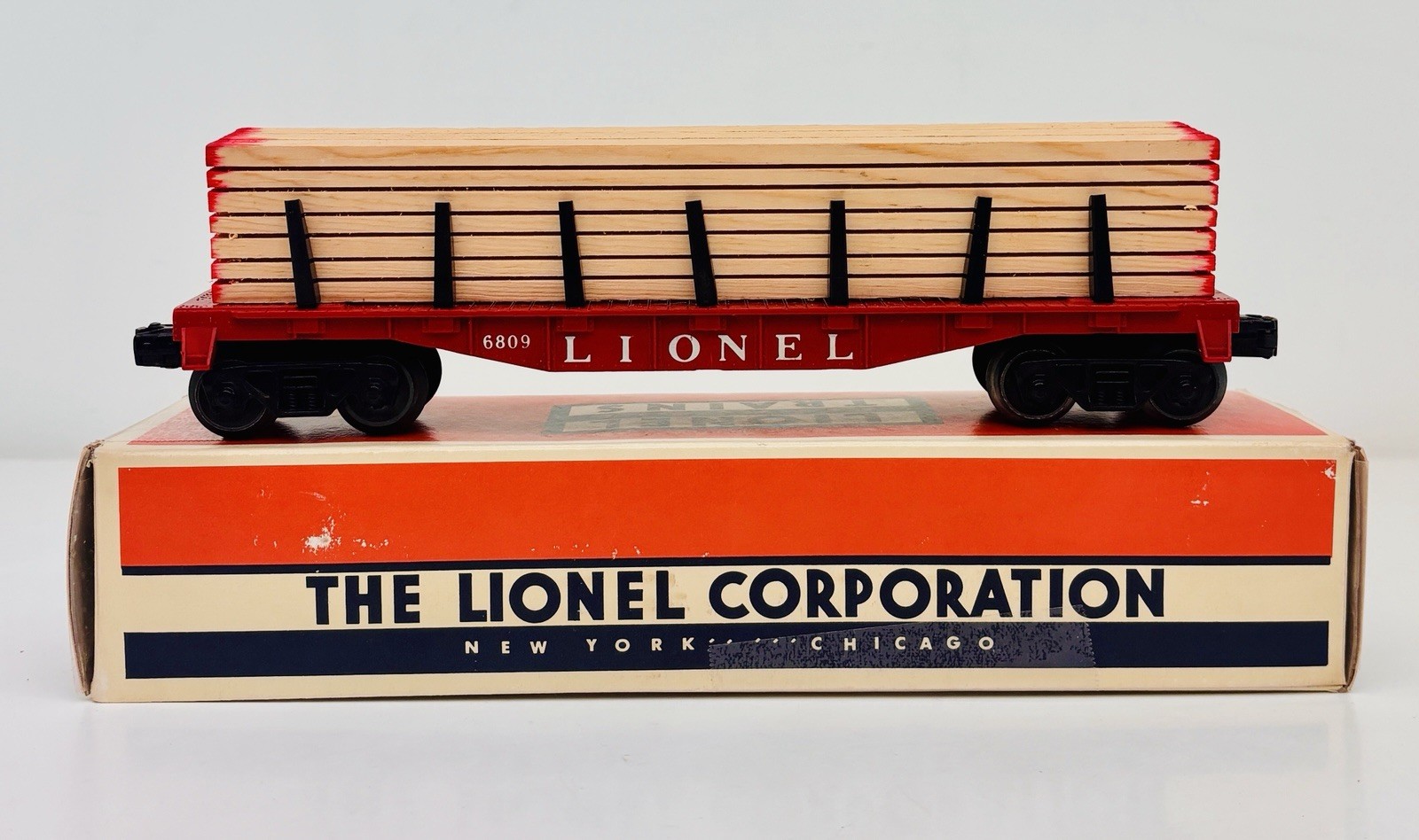 Lionel Postwar Stake Flat Car Red 6809 w/ Lumber Load & Reproduction Box