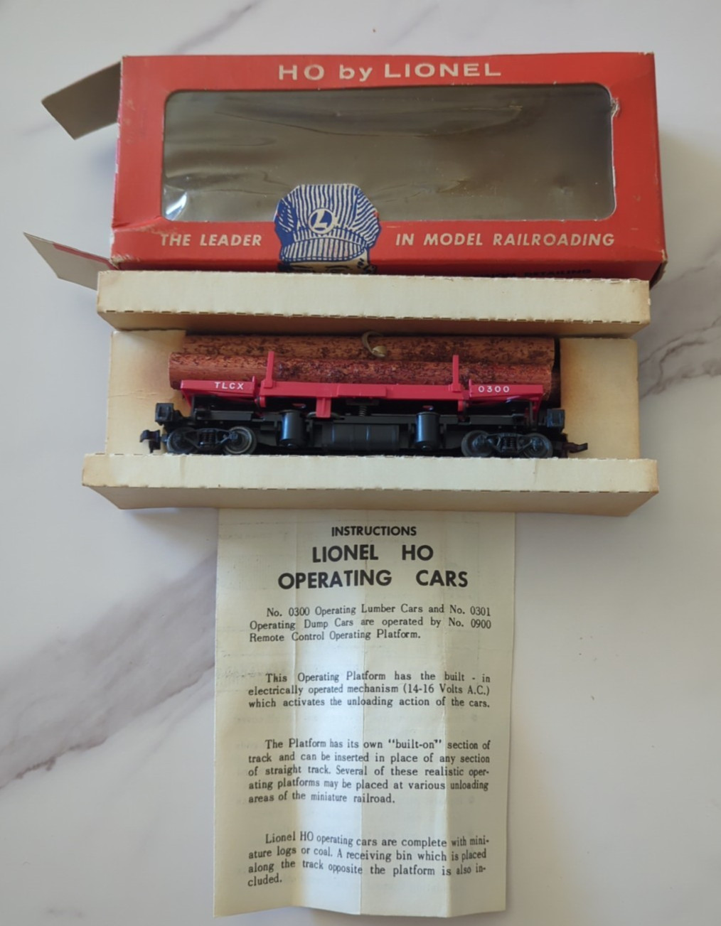 HO Scale by Lionel 0300 Log Flat Car w/ Log Tray & in Original Box