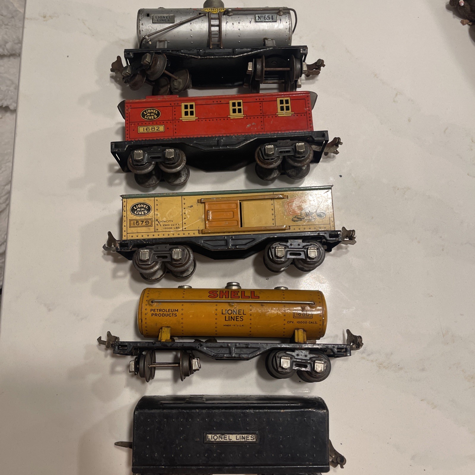 lot 5 Prewar Vintage Lionel Pressed Steel Shell Tank Baby Ruth Sunoco Coal cars