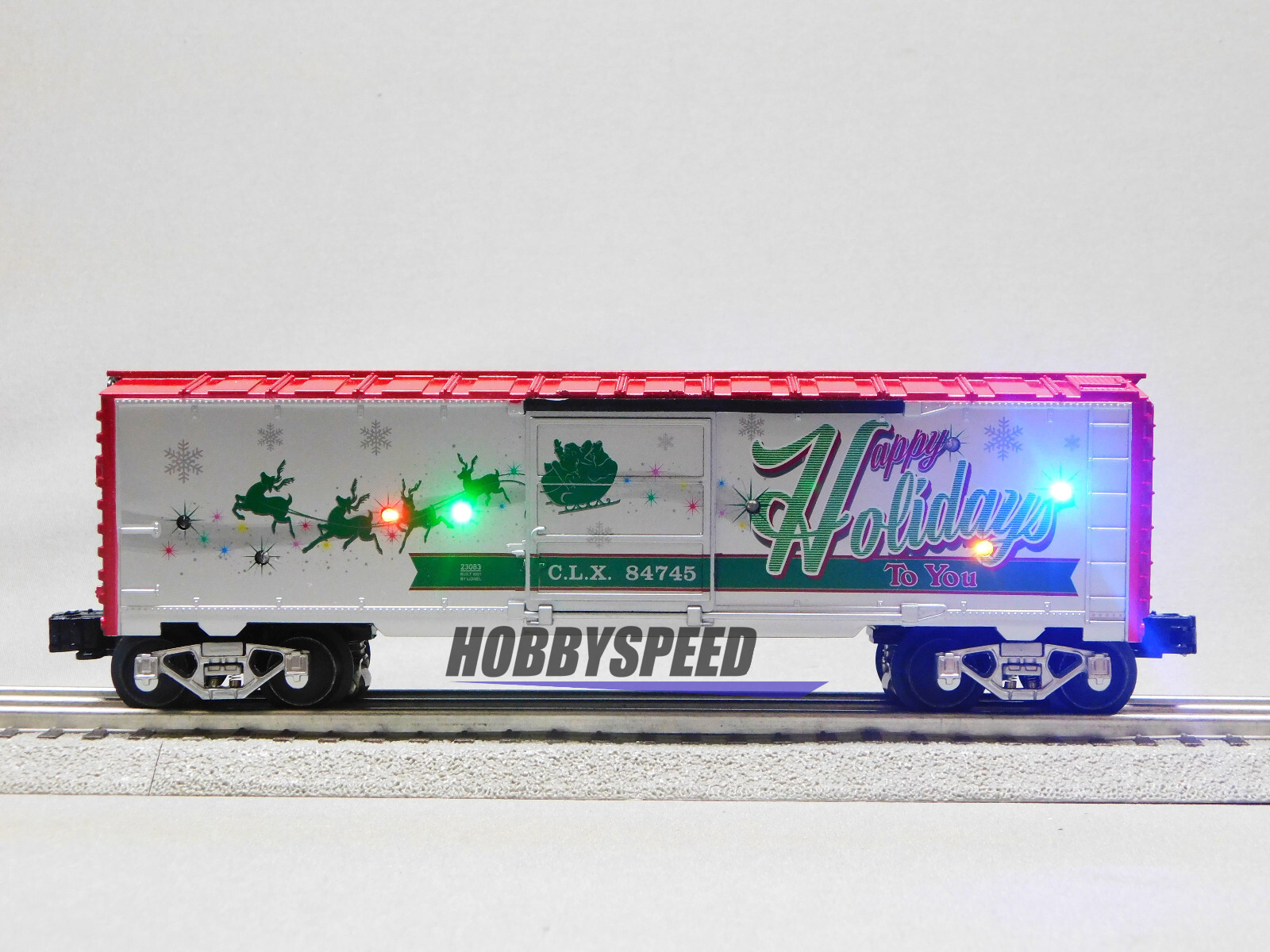 LIONEL CHRISTMAS LIGHT EXPRESS HAPPY HOLIDAYS SOUND BOXCAR O GAUGE 2123100-H NEW