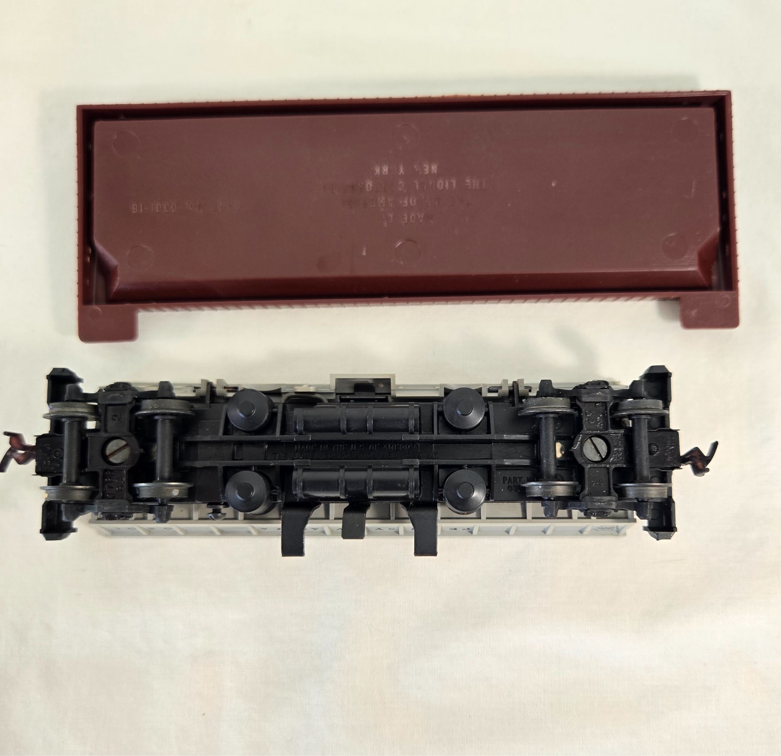 HO by Lionel 0301 Pennsylvania Operating Coal Dump Car w/Coal in Original Box