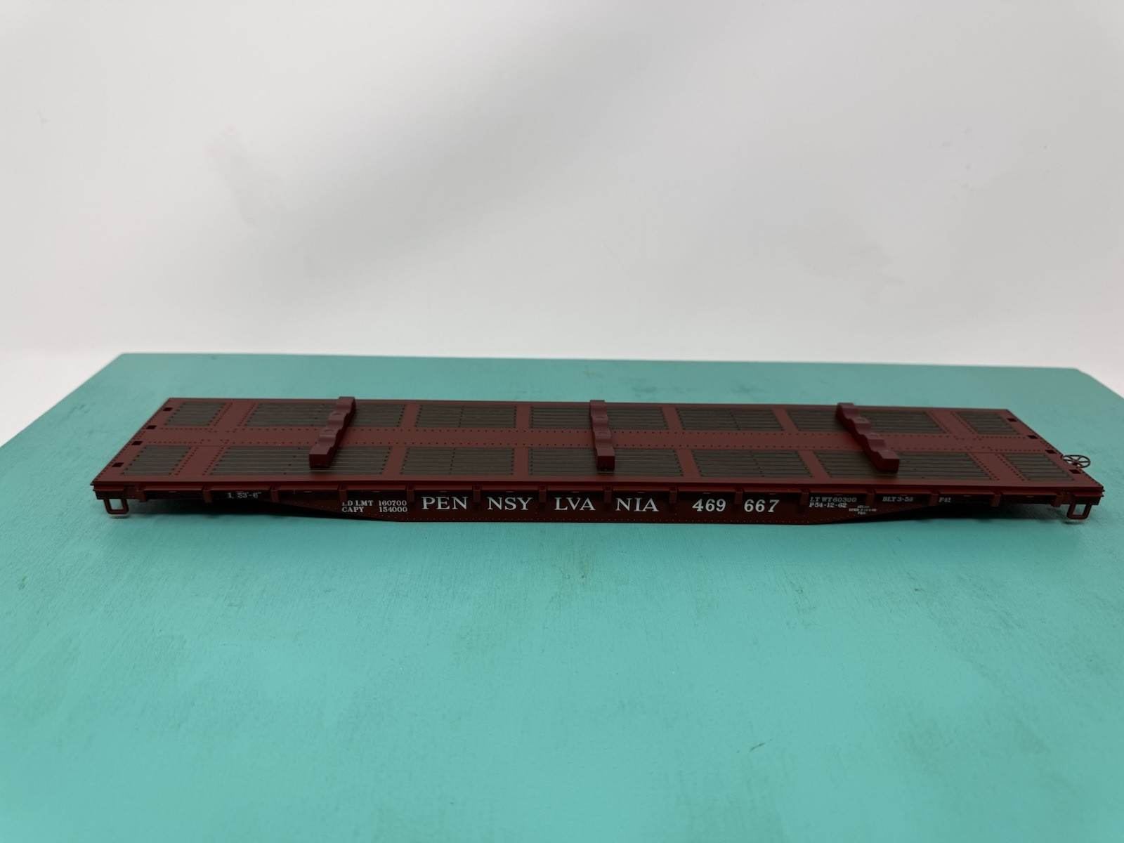 Atlas O TM 52’ Flat Car – Missing Trucks & Couplers- Pennsylvania