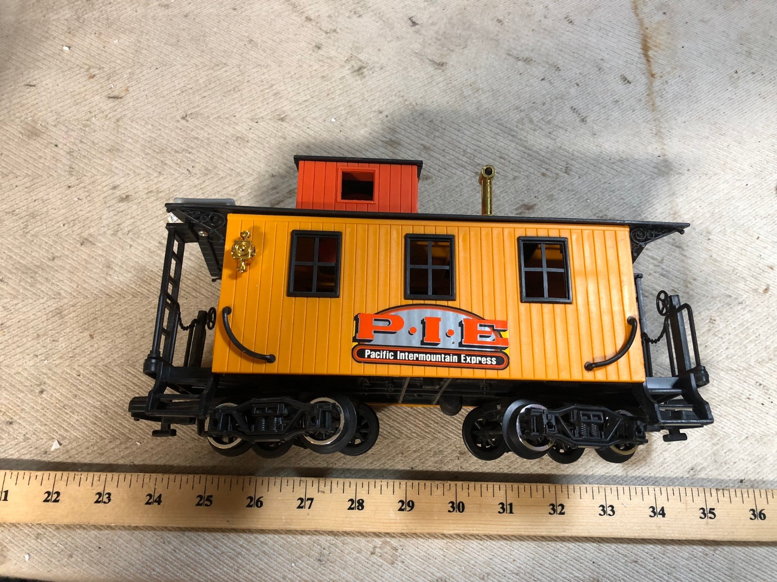 New Bright (Hong Kong) G scale Pacific Intermountain Express caboose (C)